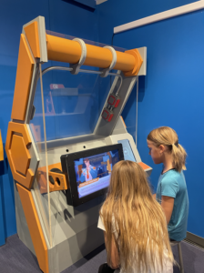 Children playing the SECRET spy game at the Texas Children's Museum