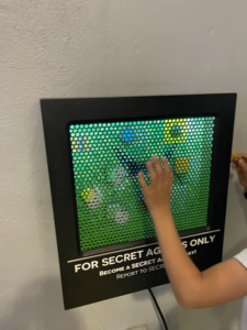 Children playing the SECRET spy game at the Texas Children's Museum