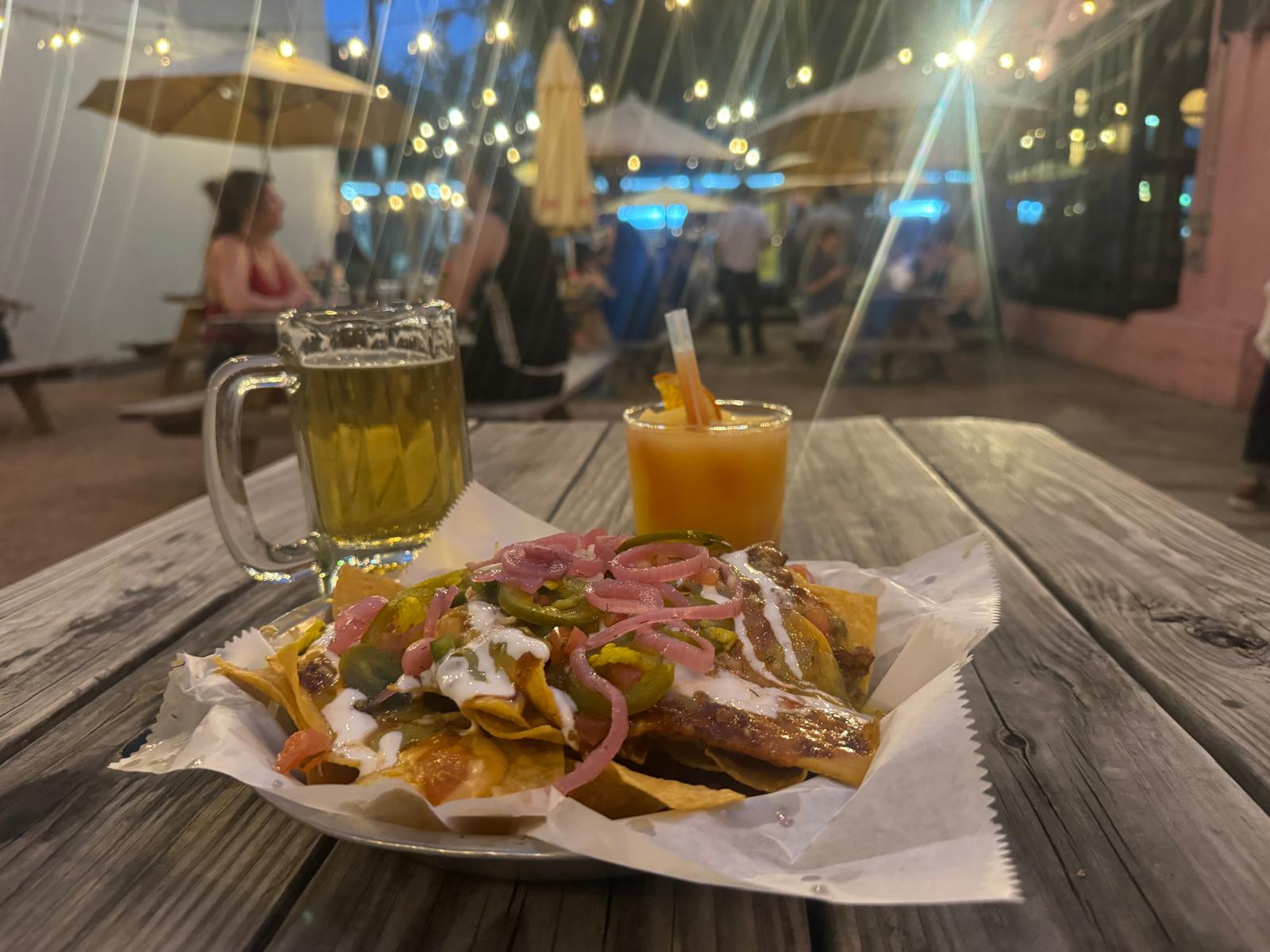 beer, Tequila Sunrise and nachos at Winnie's