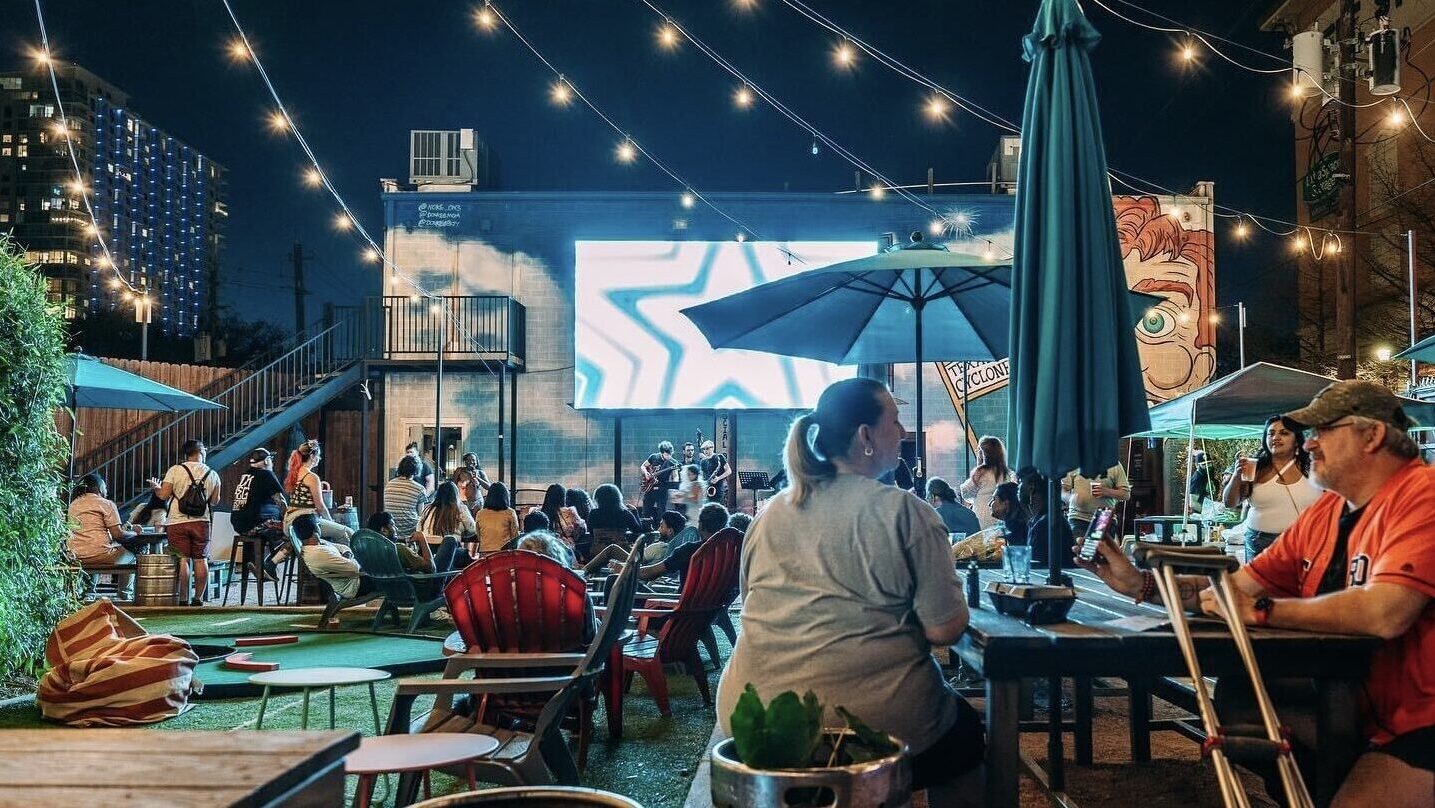 An outdoor bar with huge number of people