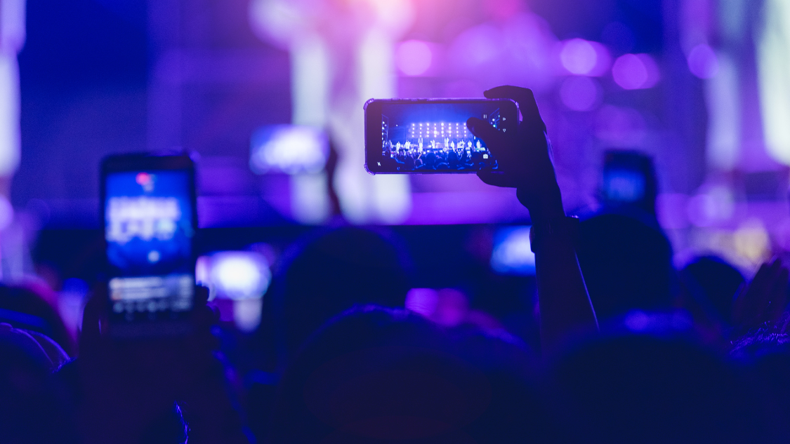 Glow of cell phones at a concert