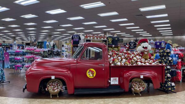 A red truck filled with plushies at Bucc-ee's